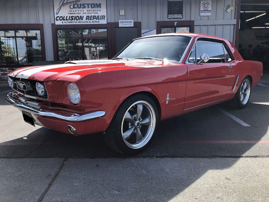 front diagonal view - 1965 Ford Mustang - red - dual stripes
